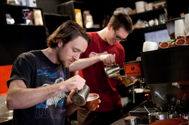 STREAT baristas creating the perfect cup of coffee