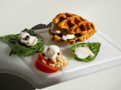 Fluffy waffle stuffed with fresh mozzarella and homemade pesto at Suite Foods