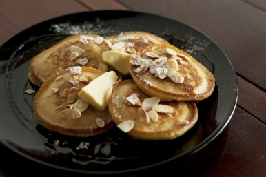 Pikelets with butter, almond flakes and honey are a hit at Artisan Roast