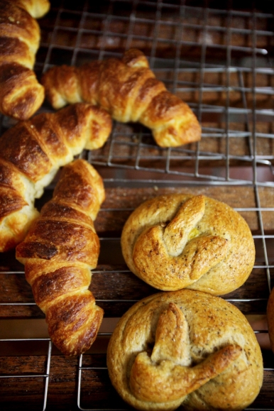 Freshly-baked croissants and multigrain bread