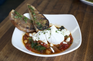 A unique dish by David LeFevre, with poached eggs harissa toast and fruit chutney