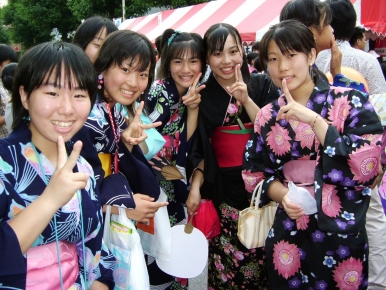 Girls clad in traditional yukata robes during the Tokasan Summer Festival