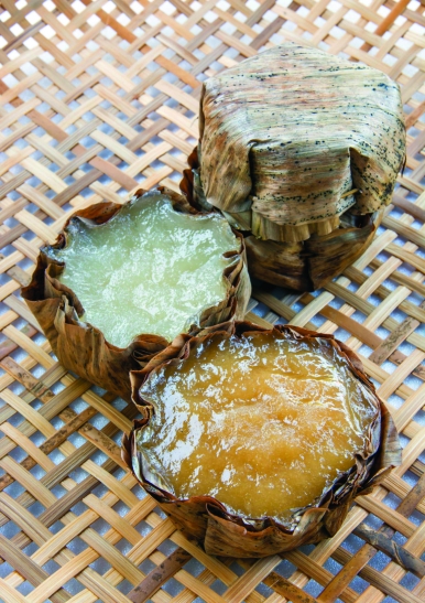 Nian gao is made by pummelling cooked rice into a springy paste to be shaped in rounded blocks