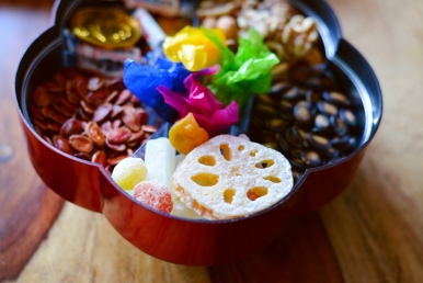 Snacks and nibbles in lacquered boxes are a common sight during Lunar New Year