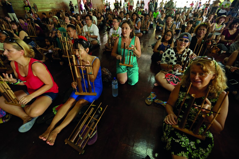 Workshop participants learning to perform the Angklung Photo © Sarawak Tourism Board