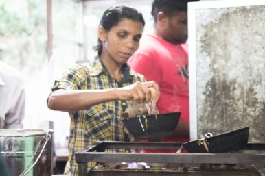 A Sri Lankan street cook at work