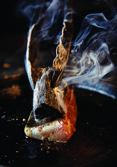 Chua’s Grilled Mackerel is cooked entirely by a heated charcoal placed on top of the fish.