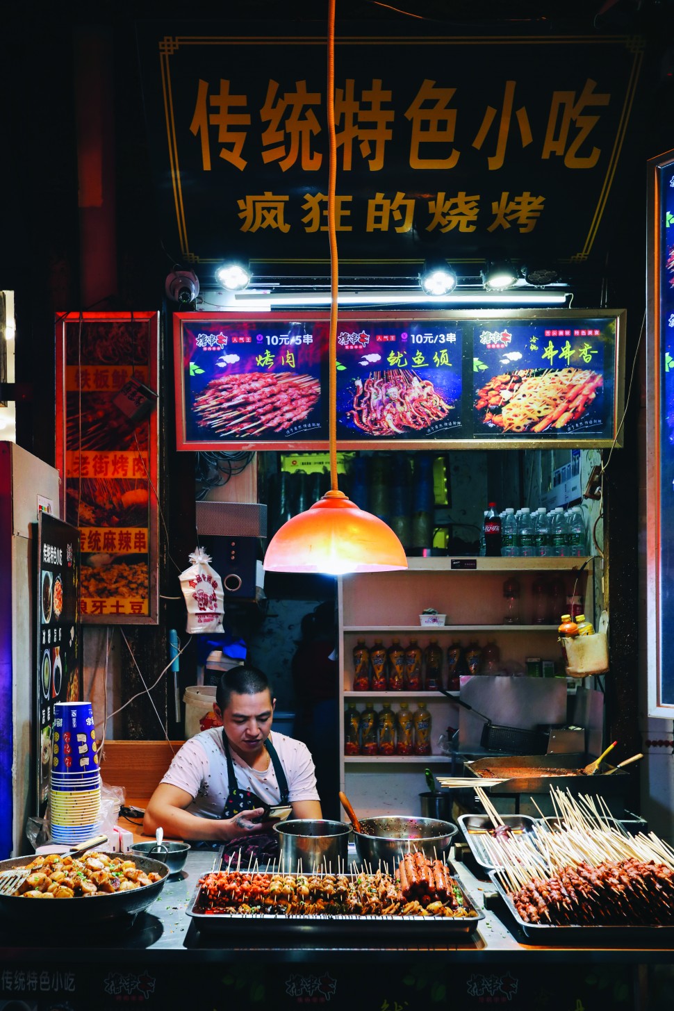 Chongqing is known for their fire-breathing spicy delicacies, including these meat skewers that are easily found on streetside stalls an peddlers