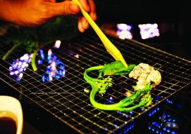Grilling vegetables on a barbecue rack
