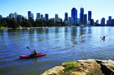 Kayaking down the Brisbane river offers spectacular views of the locale