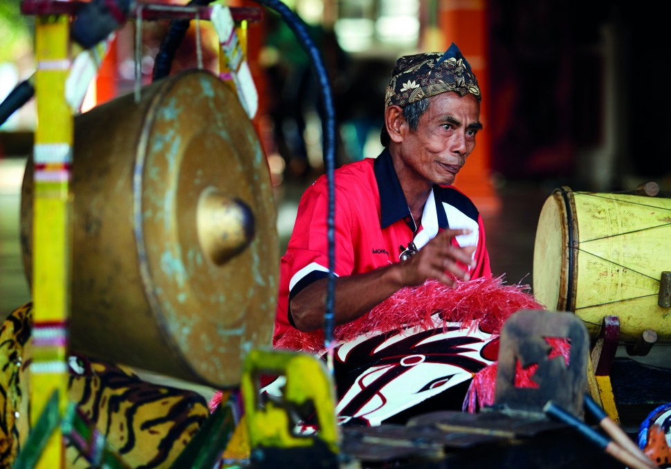 Kuda kepang dancers are accompanied by the beat of traditional gamelan music