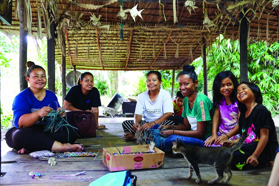 Maznah Unyan (far left) and some of the other artisans in her community