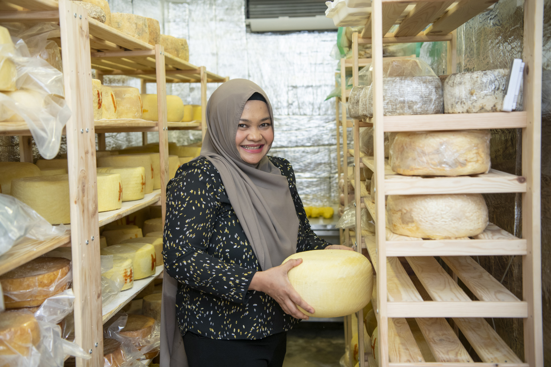 Annisa, founder of Milky Whey Cheese, in her home cheese room