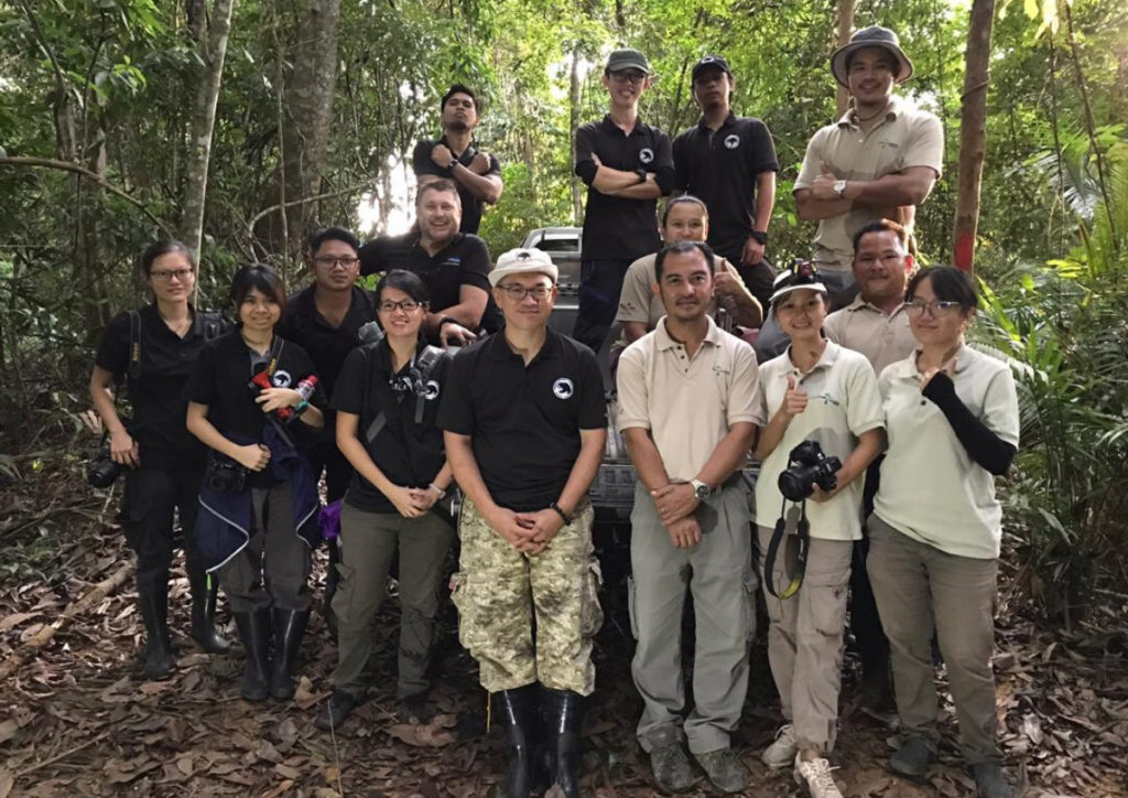 Dr. Wong with his team after releasing Momtom, its eighth sun bear release, just earlier last week