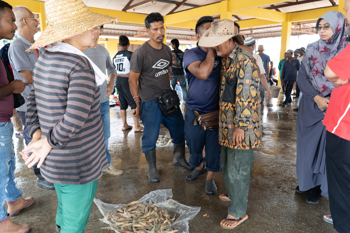 Pasar Bisik Kuala Muda gets its name from the whispering tradition observed at its seafood auctions