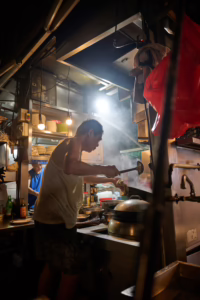 A chef at Sing Kee hardat work