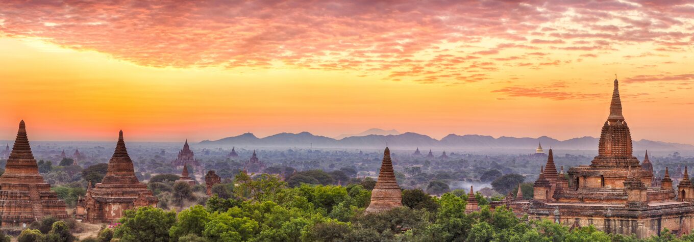 Beautiful sunrise over old pagodas of an ancient city of Bagan