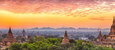 Beautiful sunrise over old pagodas of an ancient city of Bagan