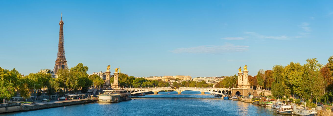 Morning sunlight panorama of Pont Alexandre III bridge with Eiffel Tower in the background in Paris