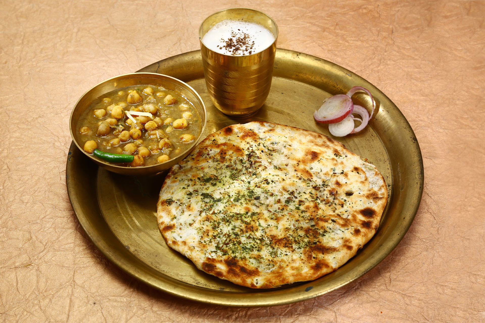 Kulcha, or oven-baked flat bread stuffed with potatoes and vegetables