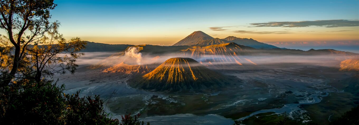 Early morning during sunrise in the mist at Mount Bromo